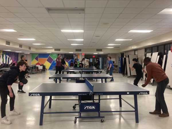 The boy team table tennis practices for their upcoming games. Photo from johndeweyhighschool.org.