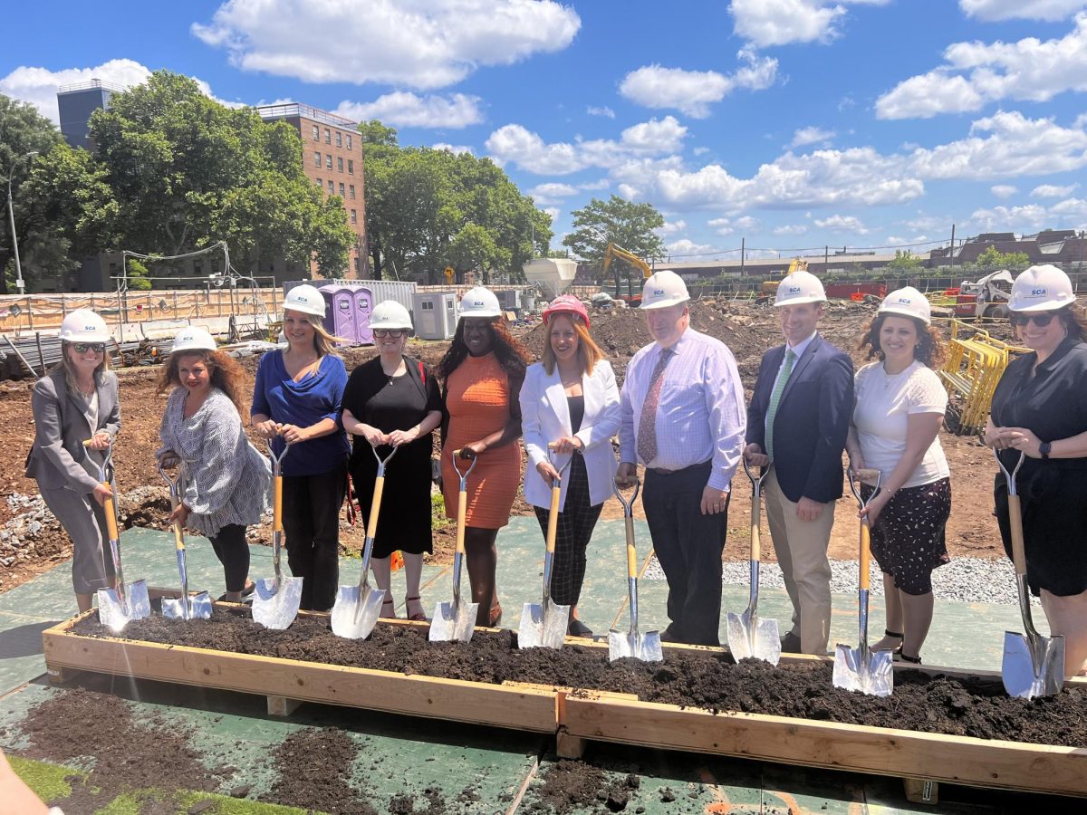 From left: Ms.Woods , Ms.Houston , Ms. Frias, Ms.Rosenblum, Ms.Adelle, Ms.Henry, Mr.Messinger , Mr.Wierzbowski, Ms.Barros, and Ms.El Amri "break ground" on the construction of a new middle school next to JDHS.