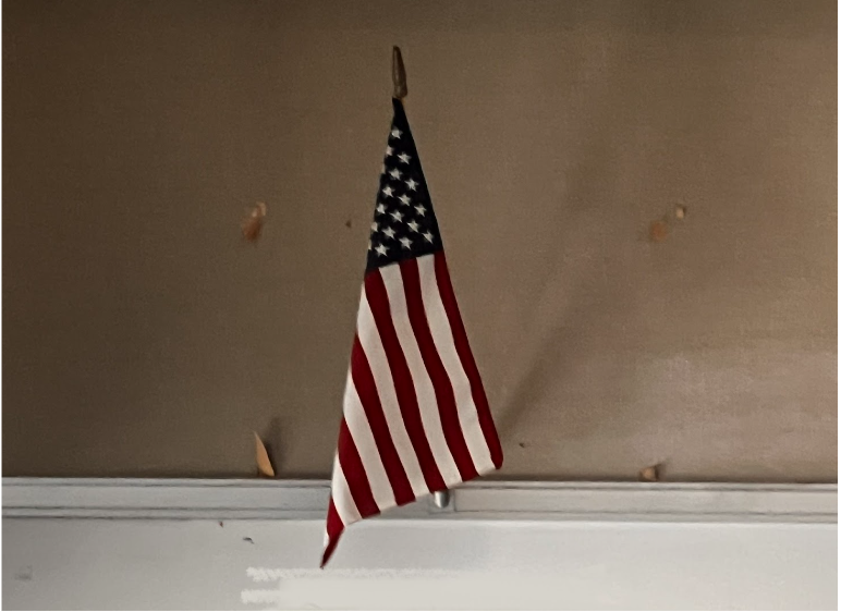 An American Flag hangs in one of the classrooms at Dewey. 