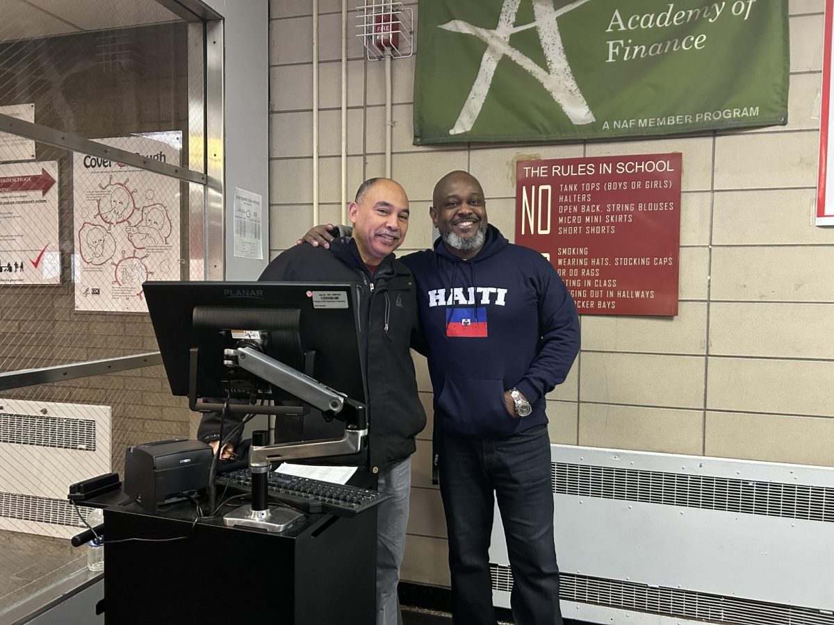 Mr. Abdalla and Mr. Danticat during the morning rush of scanning, where deans and school safety agents work closely together to ensure students enter the building in a safe and efficient manner. 