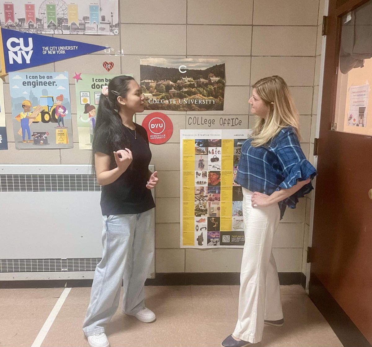 Junior Ray Capitulo and senior advisor Ms. Mazzola conversing in front of the College Office on June 6, 2025.