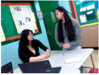 Senior Karen Lin (left) can often be found carrying and utilizing her digital camera throughout the school day.