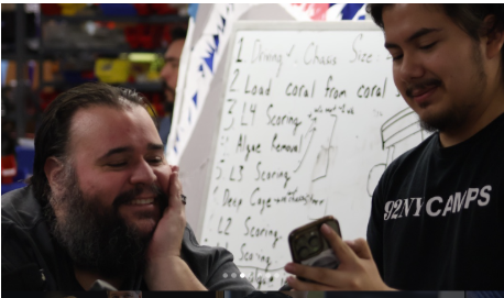 Mr. Dispenza supporting the ideas of the student mentors during 'Build Season'. 