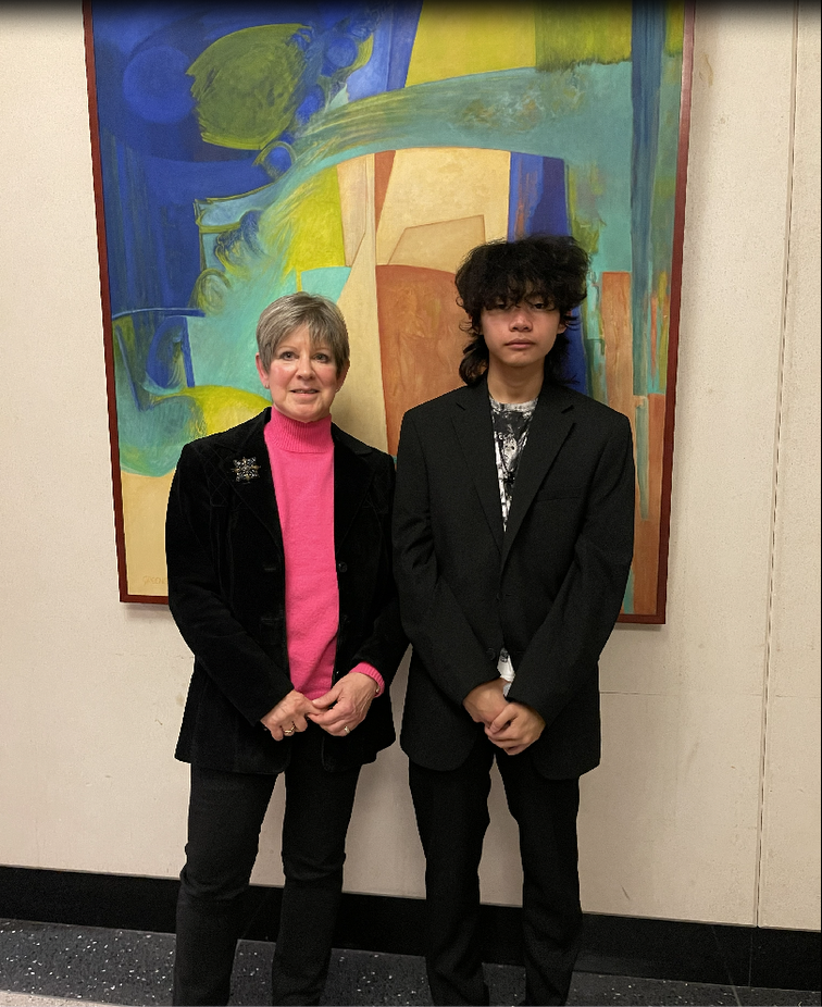Ms. Rosalia and Brandon Capitulo pose for a photo shortly after the award ceremony.